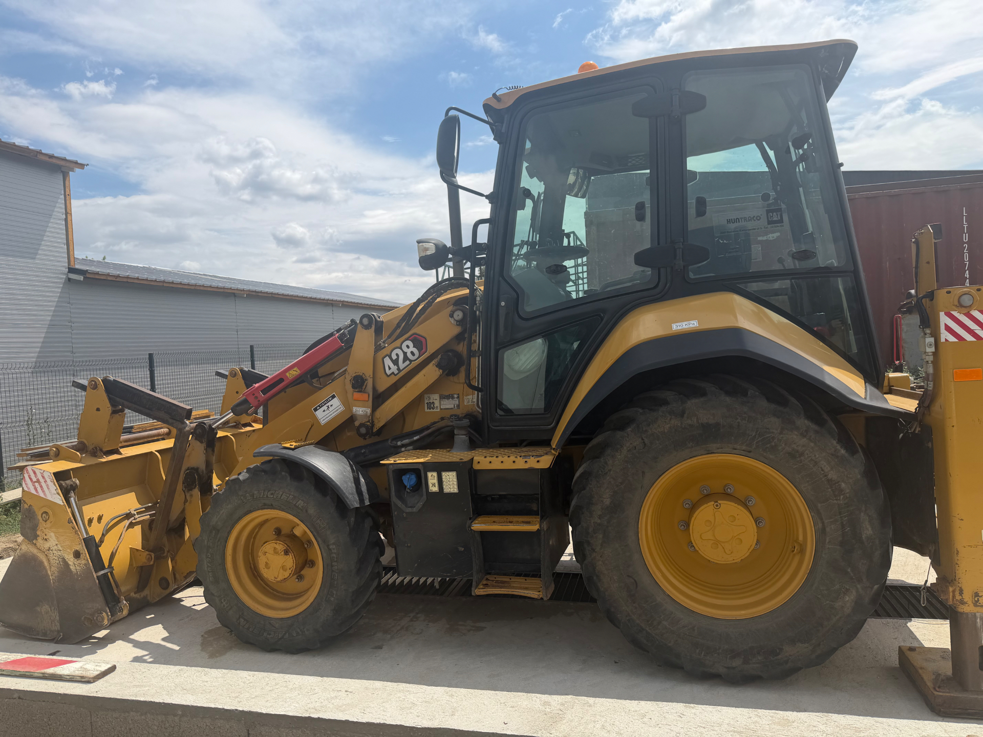 Caterpillar 428 univerzális kotrórakodó